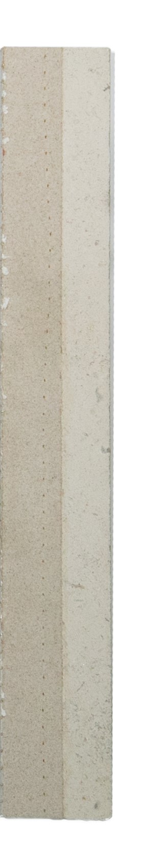 Close-up of a Cristolite lightweight stone cladding panel featuring a composite backing board for enhanced strength and reduced weight.