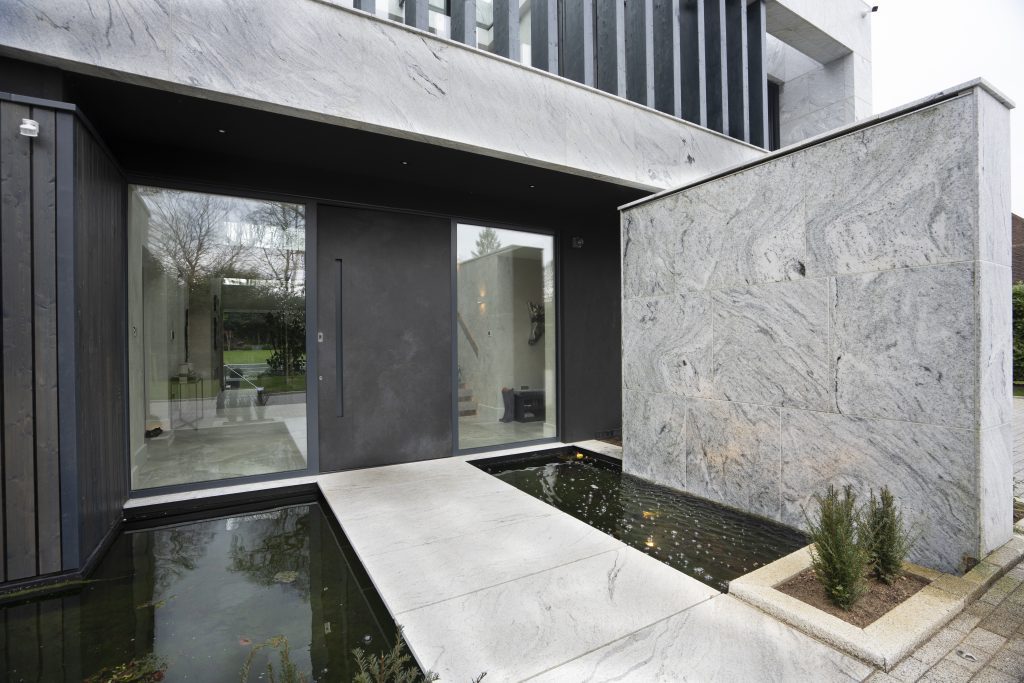 Selbourne House exterior with lightweight stone cladding panels to entrance of property.