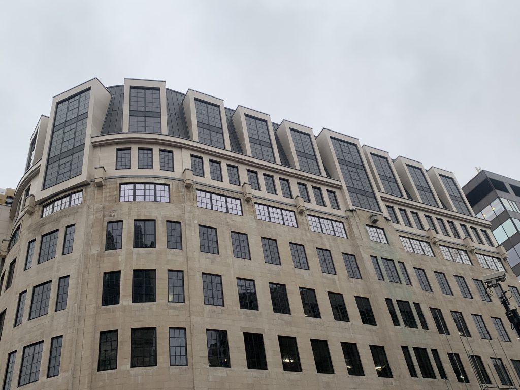 Candlewick project showing lightweight Moleanos cladding on two-storey extension on top of existing Portland facade.