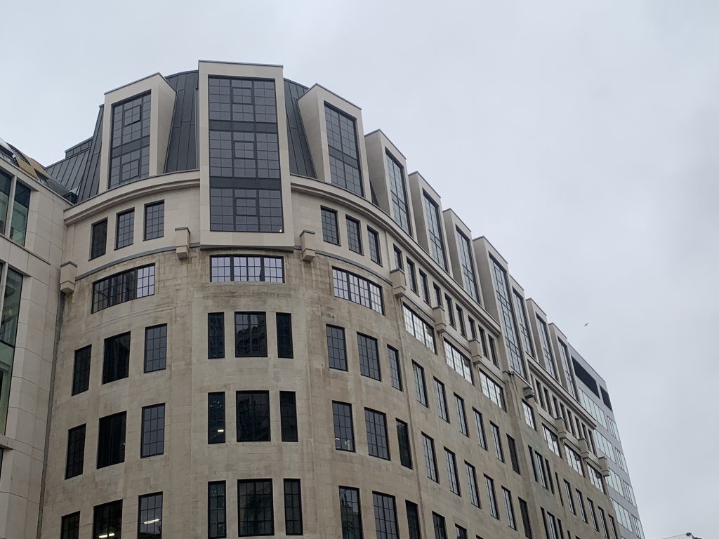 Candlewick project showing lightweight Moleanos cladding on two-storey extension on top of existing Portland facade.